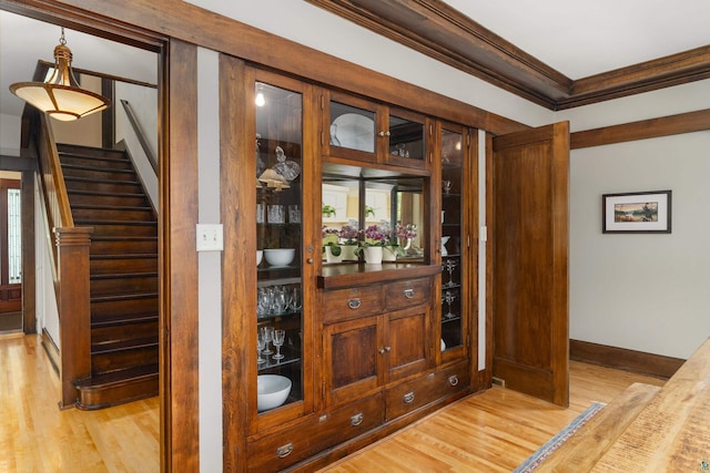 room details featuring hardwood / wood-style floors and ornamental molding