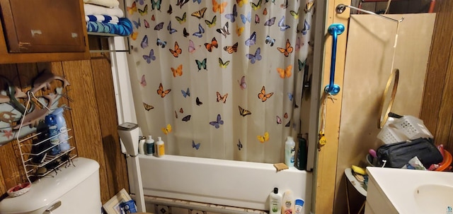 full bathroom featuring shower / tub combo, vanity, and toilet