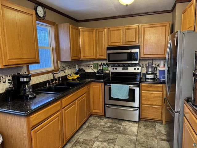 kitchen with tasteful backsplash, sink, ornamental molding, and appliances with stainless steel finishes