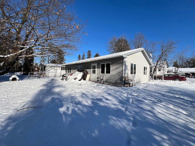 view of snow covered property