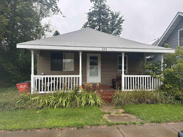 bungalow-style home with a porch