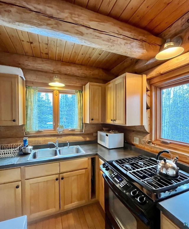 kitchen with beam ceiling, sink, wooden ceiling, light brown cabinetry, and black range