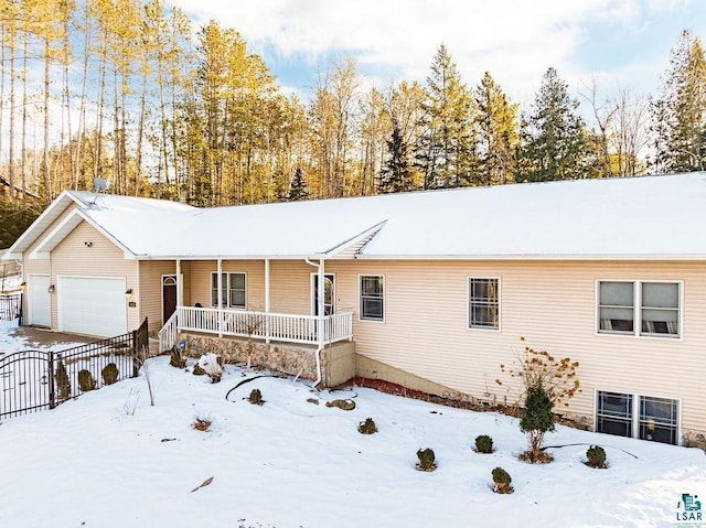 ranch-style home with a garage