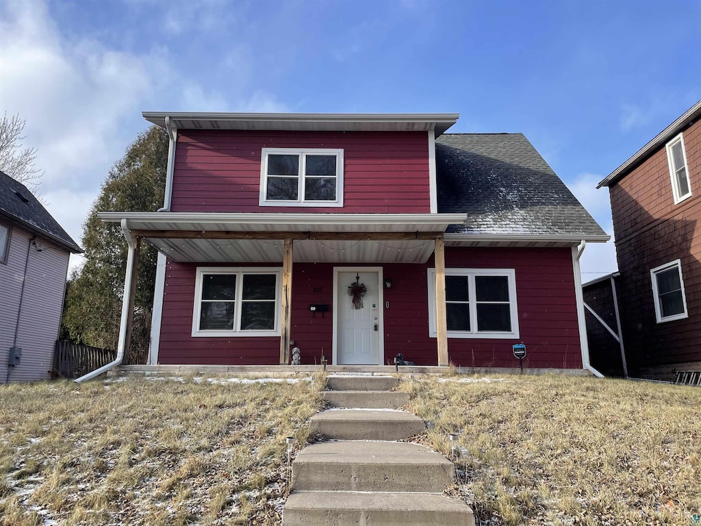 view of property with a porch