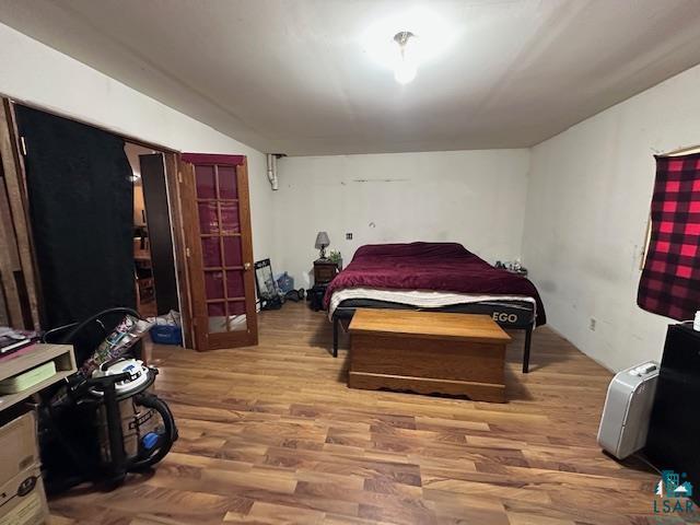 bedroom featuring hardwood / wood-style flooring