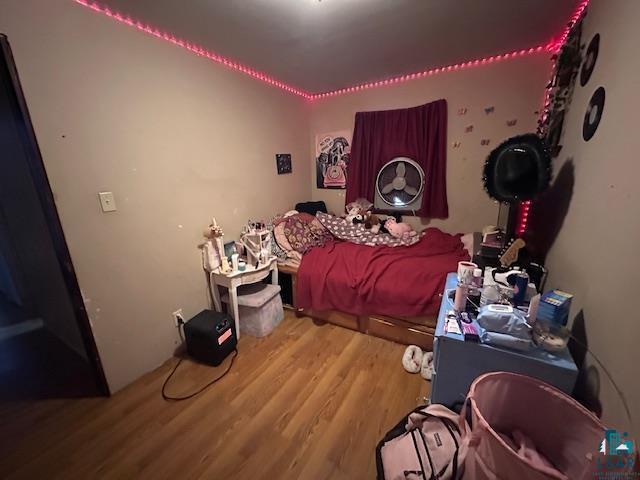 bedroom featuring hardwood / wood-style floors