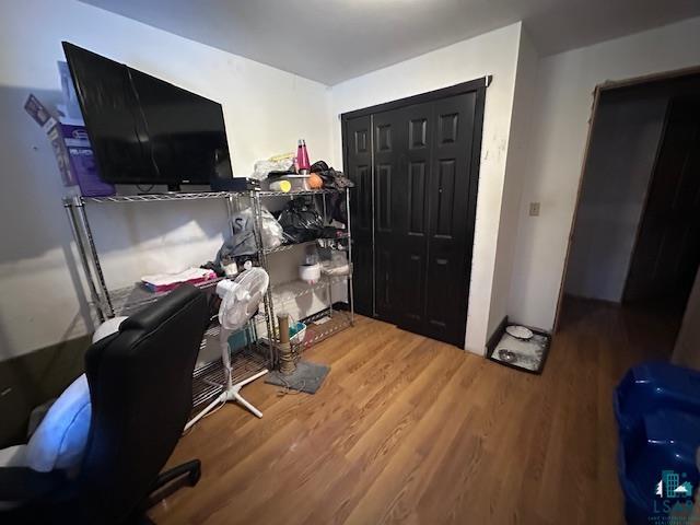 office area with hardwood / wood-style flooring