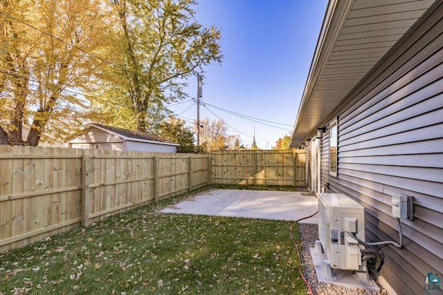 view of yard featuring a patio area and ac unit