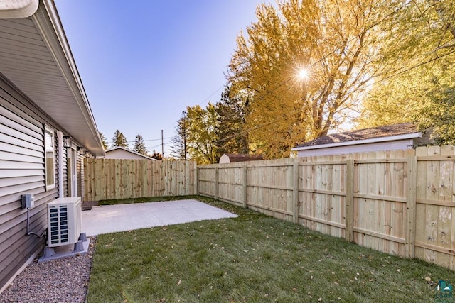 view of yard featuring ac unit and a patio area