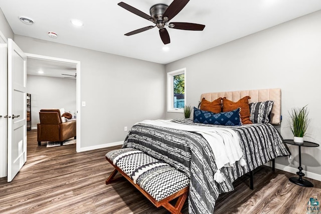 bedroom featuring ceiling fan and wood-type flooring