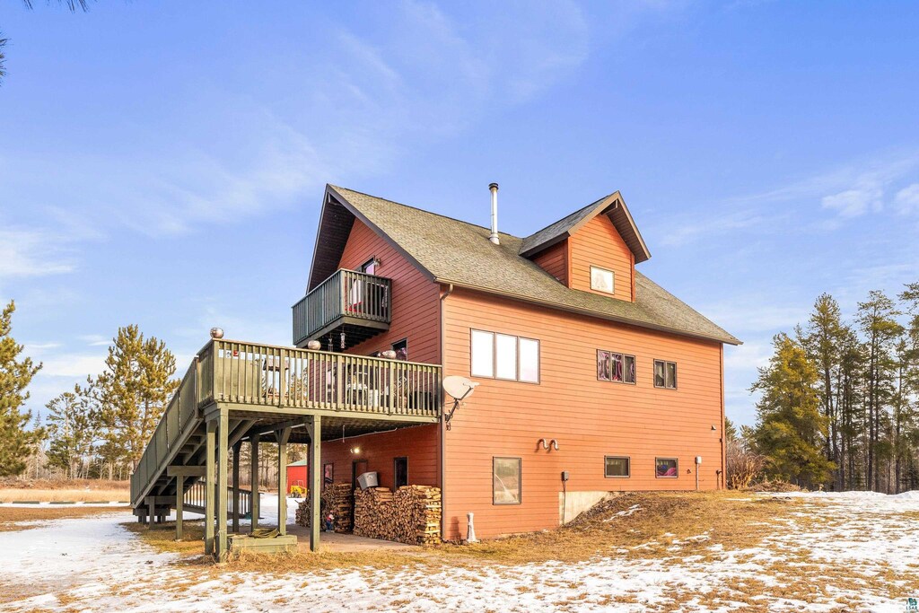 275 Jackpine Dr, Cloquet, MN 55720 - snow covered property featuring a deck