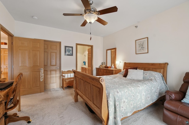 carpeted bedroom featuring ceiling fan and a closet