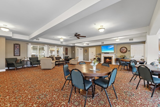 dining space featuring ceiling fan