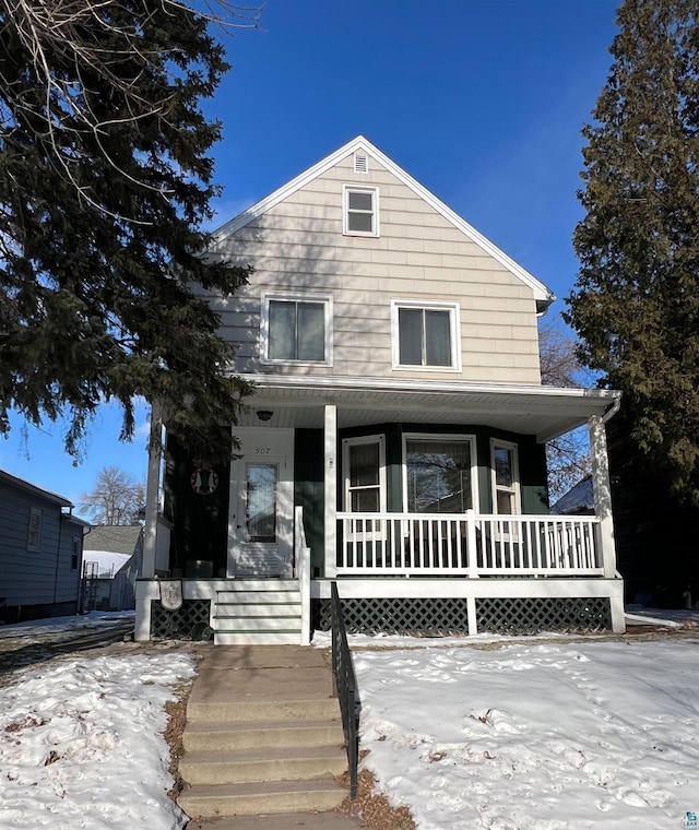 view of front of home featuring covered porch