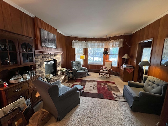 carpeted living room with crown molding, wooden walls, and a brick fireplace