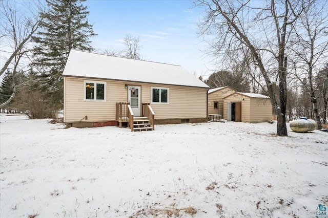 view of front of property with an outbuilding