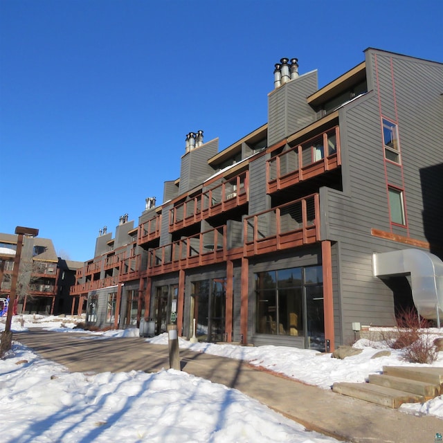 view of snow covered property