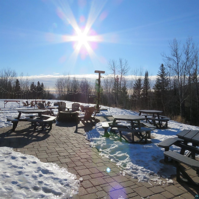 view of snow covered patio