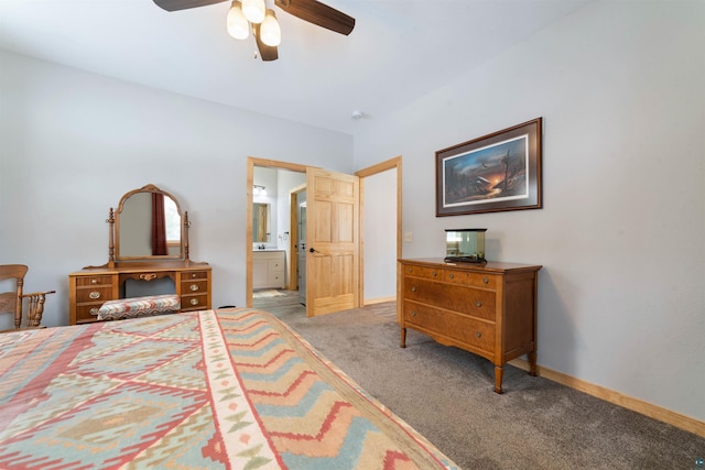 carpeted bedroom with connected bathroom and ceiling fan