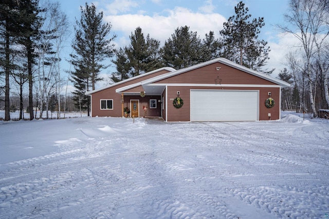 single story home with a garage