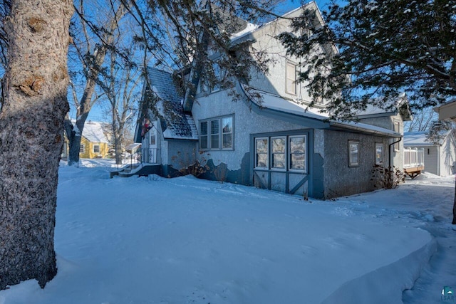 view of snow covered property