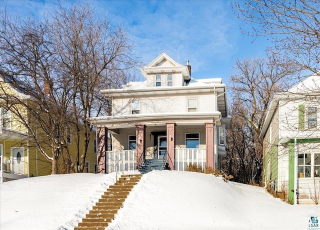 view of front of home featuring covered porch