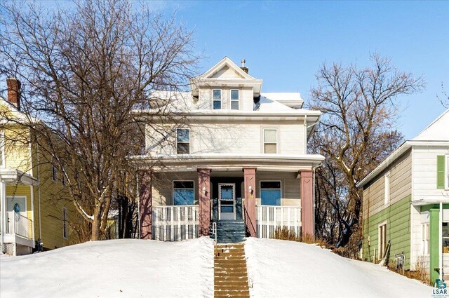 view of front of home featuring covered porch