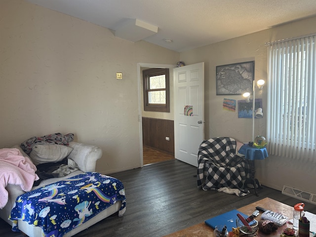 bedroom featuring dark wood-type flooring