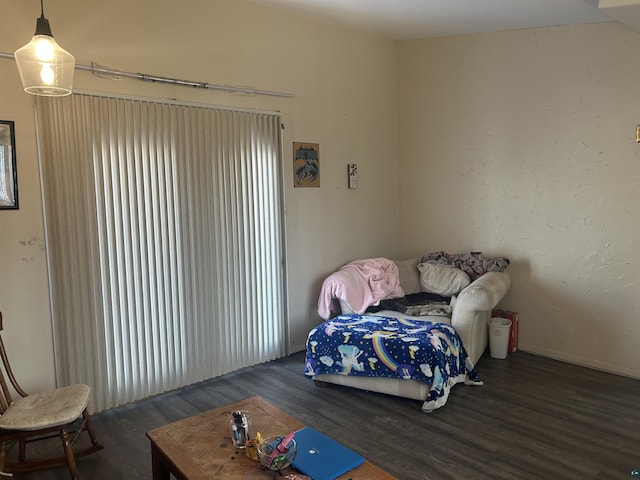 bedroom featuring dark hardwood / wood-style flooring