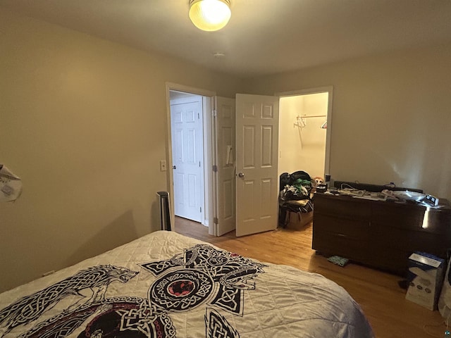 bedroom with light hardwood / wood-style flooring