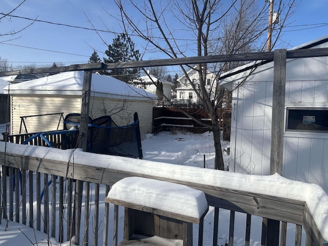 view of snow covered deck