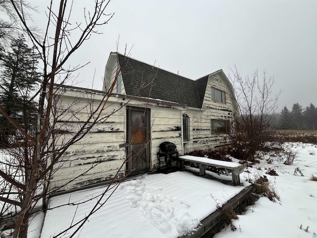 view of snow covered property