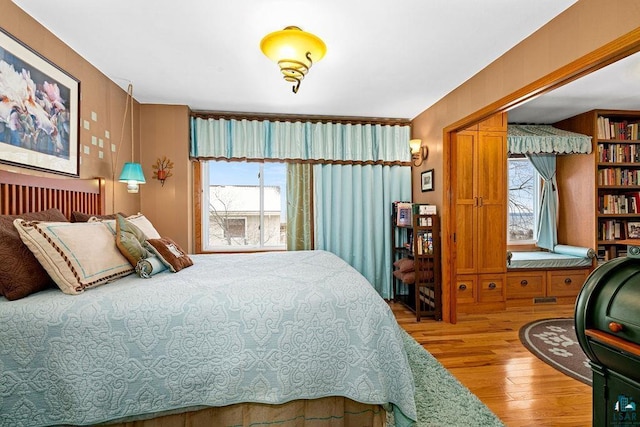 bedroom featuring hardwood / wood-style flooring