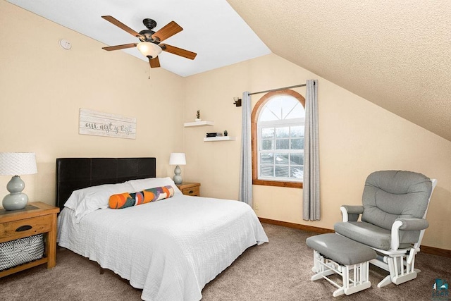 carpeted bedroom featuring ceiling fan, a textured ceiling, and lofted ceiling