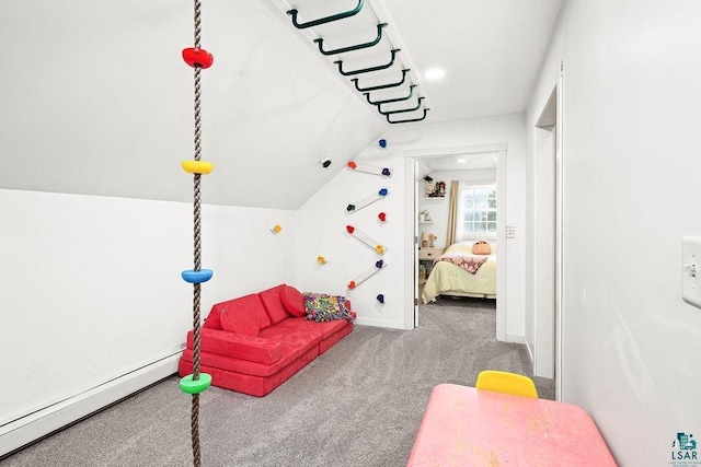 playroom featuring baseboard heating, carpet, and lofted ceiling