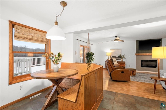 dining area featuring ceiling fan