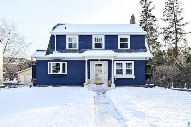 front facade with a garage