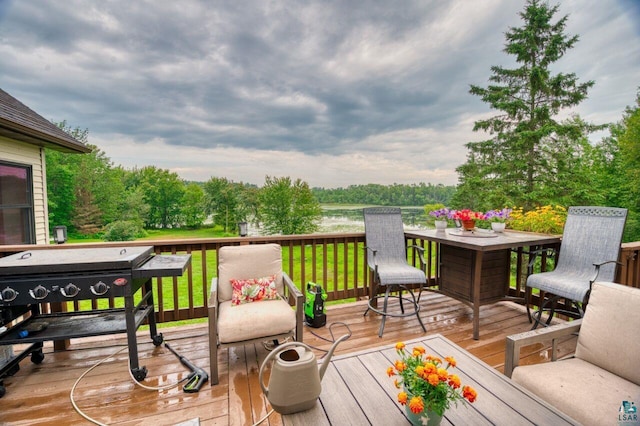 wooden deck with a yard