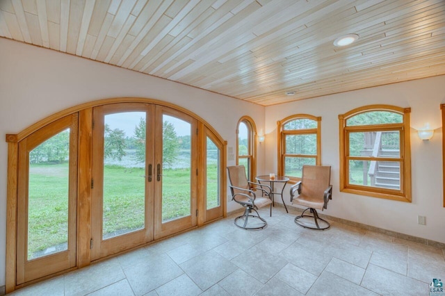 interior space featuring french doors and wooden ceiling