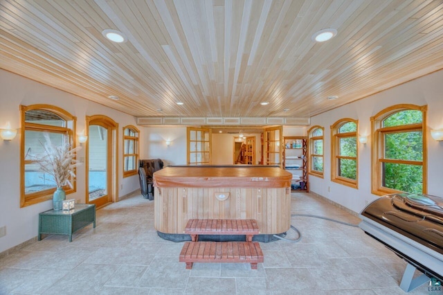 kitchen featuring french doors and wood ceiling