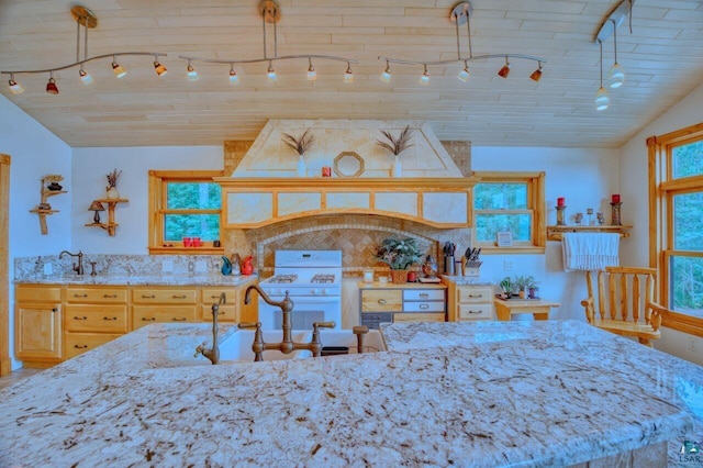 bedroom with sink, wood ceiling, and vaulted ceiling