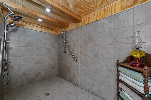 7596 Werner Rd, Virginia, MN 55720 - bathroom featuring a tile shower, wooden ceiling, and beam ceiling