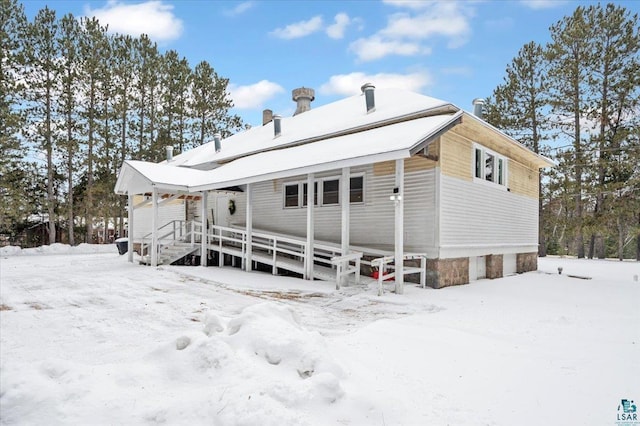 7596 Werner Rd, Virginia, MN 55720 - view of snow covered house
