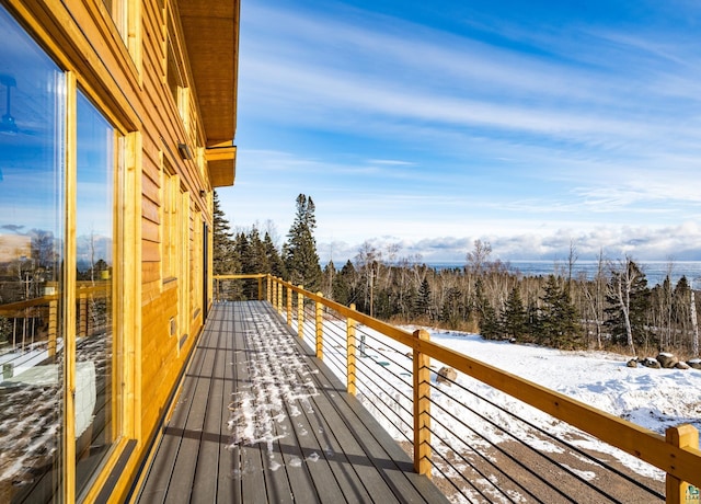 view of snow covered deck