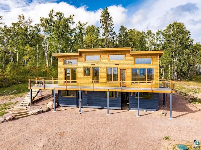 view of front of property featuring a wooden deck