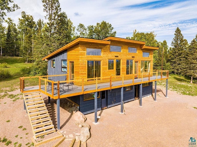 view of front of home with a deck