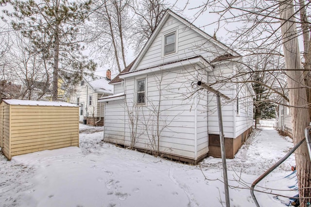 view of snow covered property