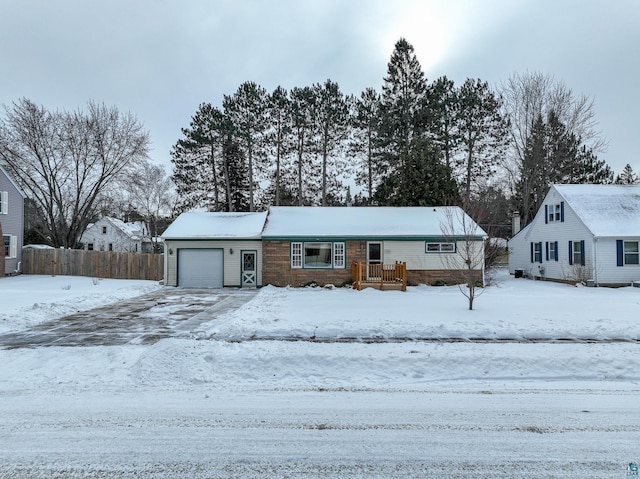 view of front of home with a garage