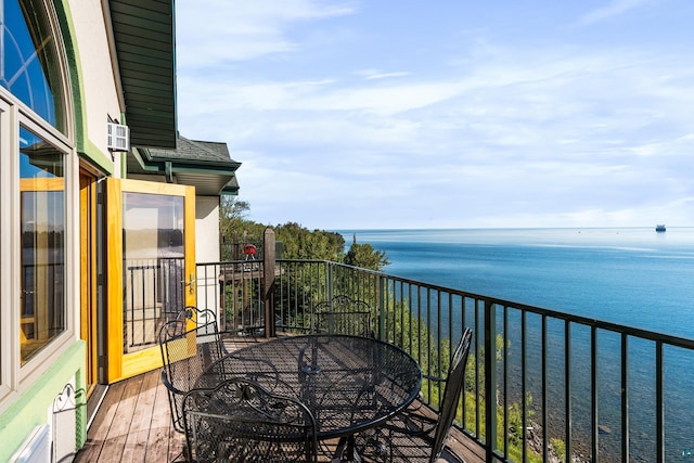 balcony featuring a water view