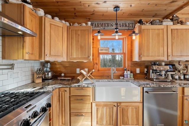 kitchen featuring pendant lighting, sink, wall chimney range hood, appliances with stainless steel finishes, and wooden ceiling